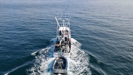 Pink salmon seining vessel travels to the fishing grounds on the open ocean.