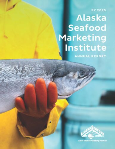 Front cover of annual report shows a fisherman in a yellow jacket and orange gloves holding a fish. Text reads 